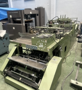 MÁY MẶC ÁO SÁCH